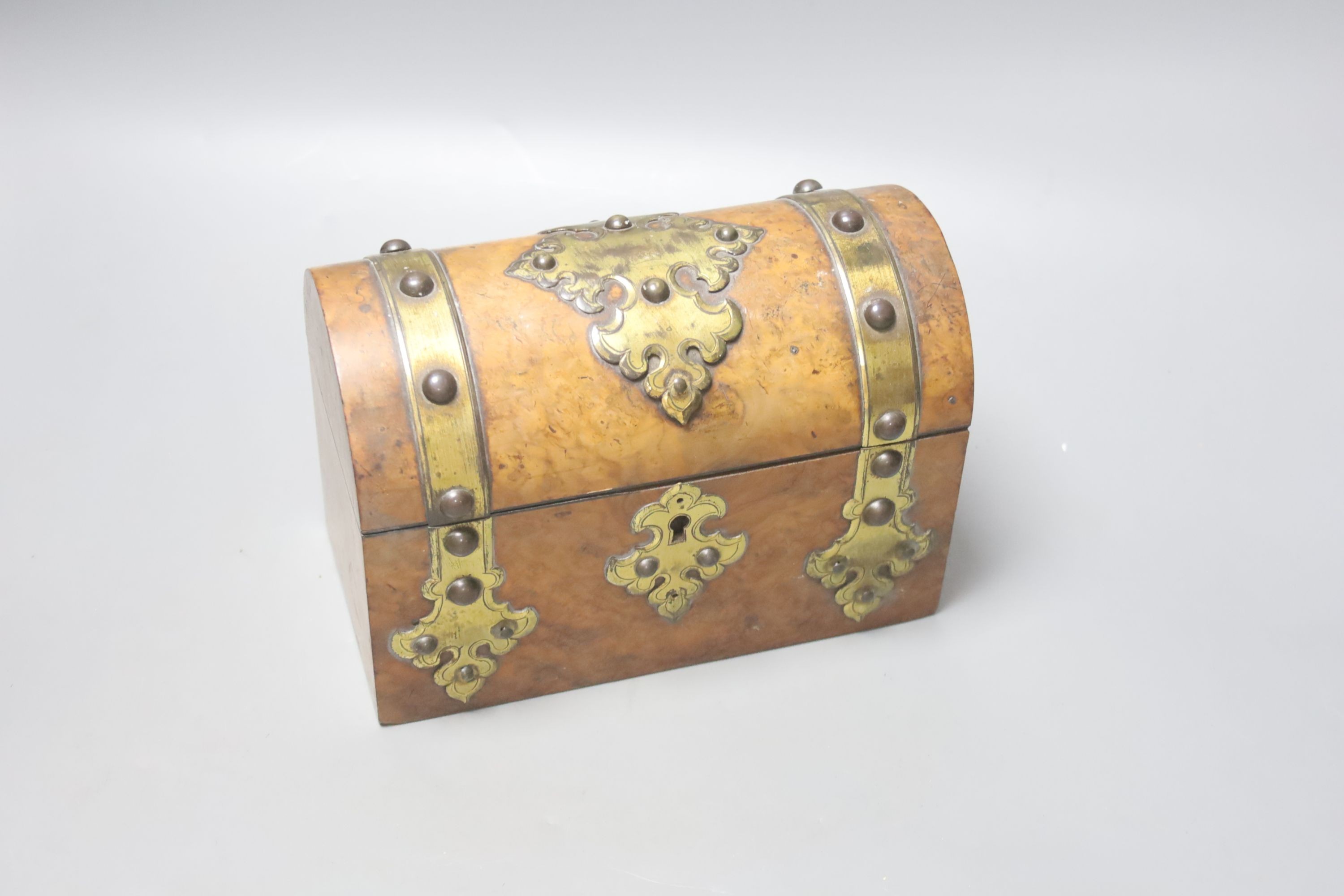 A Victorian rosewood sarcophagus tea caddy, 36.5 cm, a mahogany caddy and a Victorian Walnut and brass mounted casket